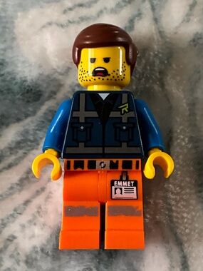 LEGO Minifigure Emmet Blue Torso Orange Legs Yellow Head Brown Hair